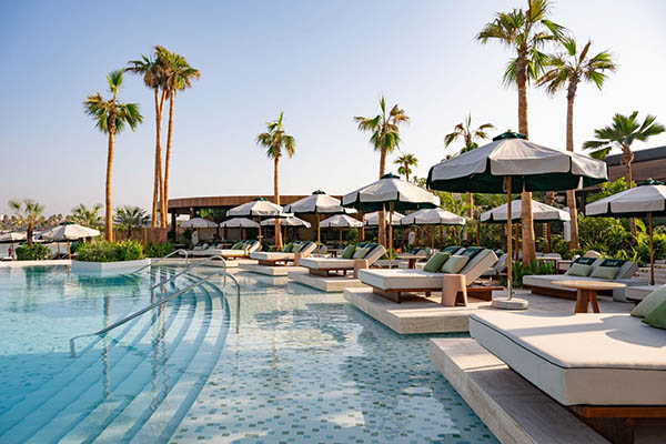 Illustrated poolside setting at Bâoli Dubai