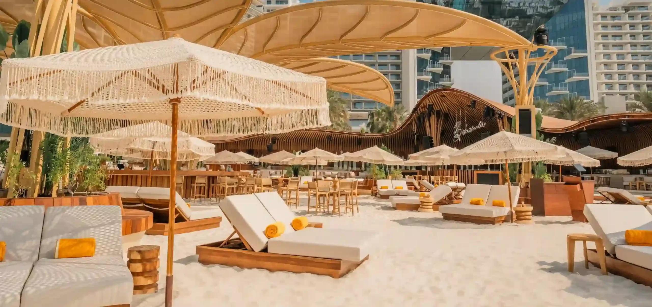 Bohemia Beach Club’s sunlit beachfront terrace at FIVE Palm Jumeirah