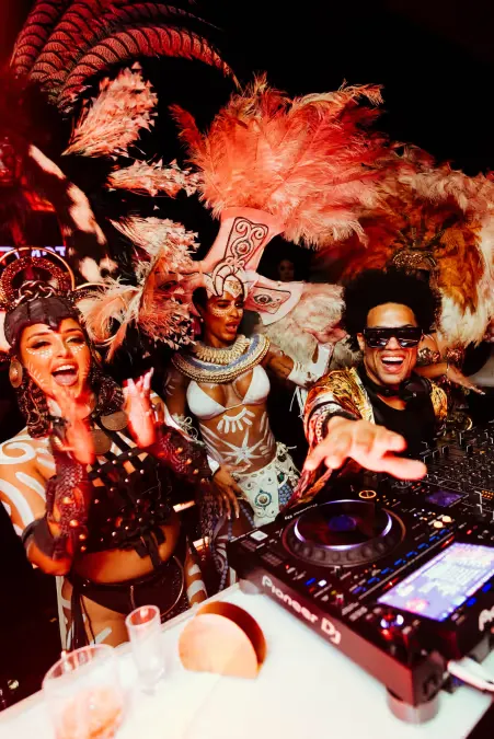 Guests near a DJ booth during an earlier Penthouse night; no individual is identified